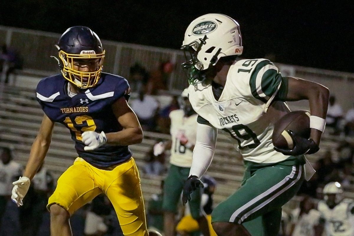 Sophomore defensive player Aiden Hamilton tries to tackle the Miami Central Rockets' wide receiver as he zooms past the defense in the third quarter on September 12, 2024. The team lost 67-0.