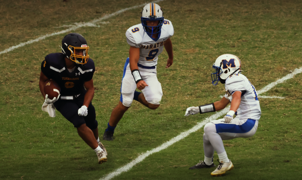 Senior Ayden Jaouhar moves down the field to attempt a touchdown